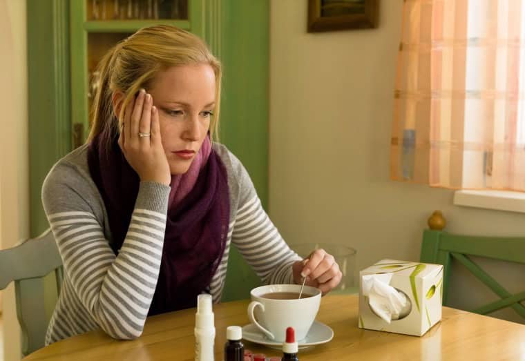 woman with tea sick - PayReel