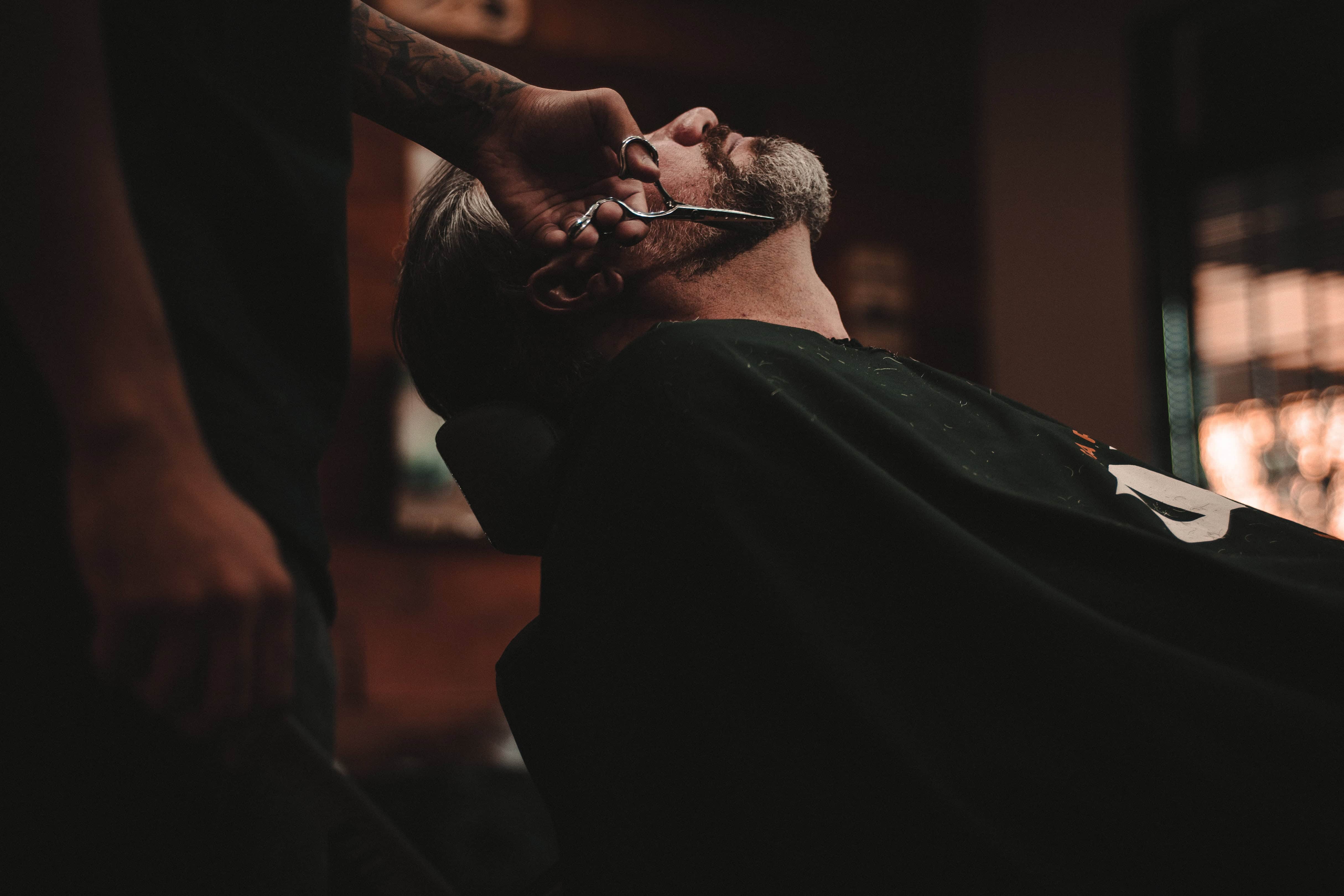 Man getting beard trimmed - PayReel