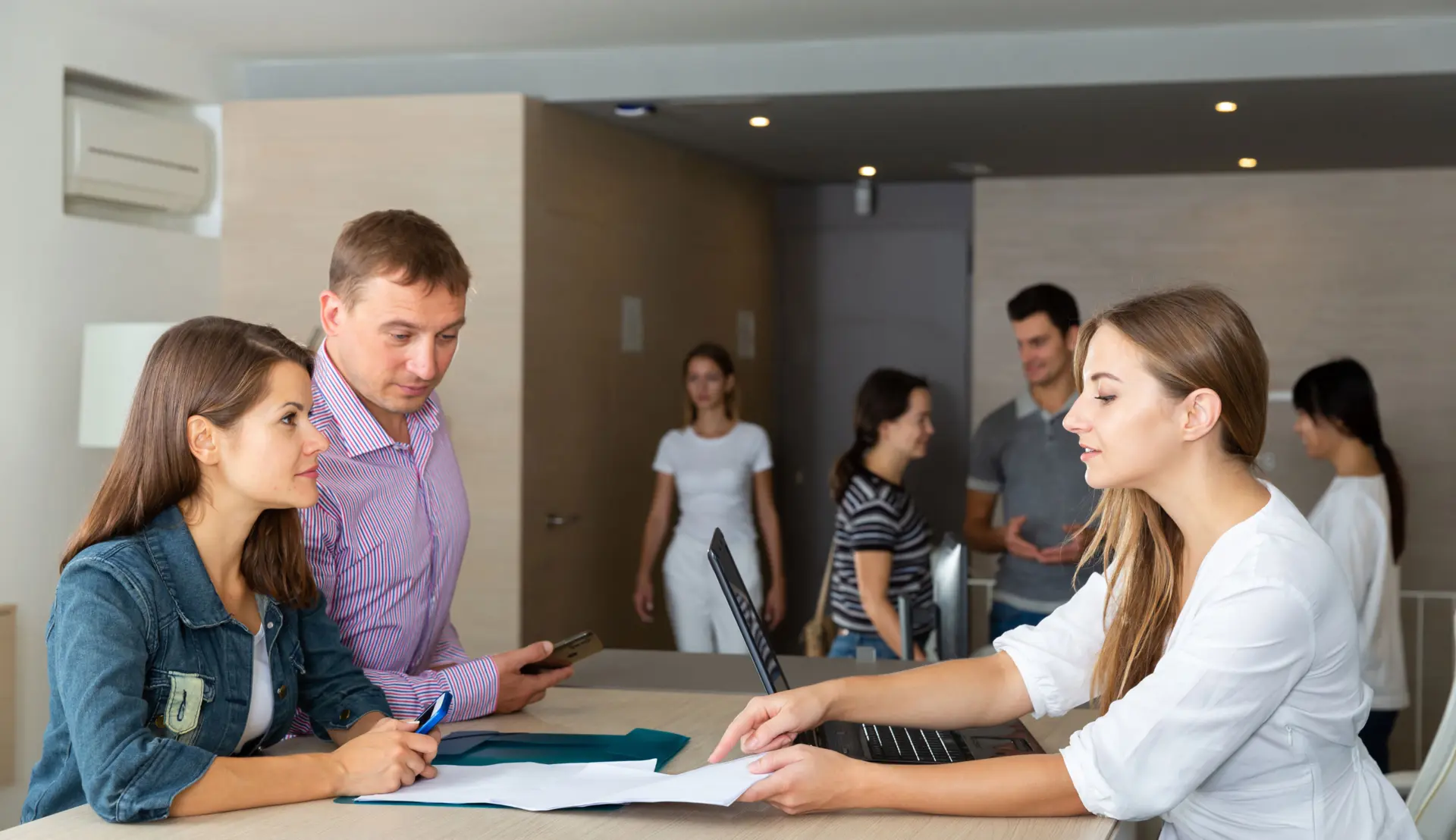 Female employee of staffing agency consulting clients